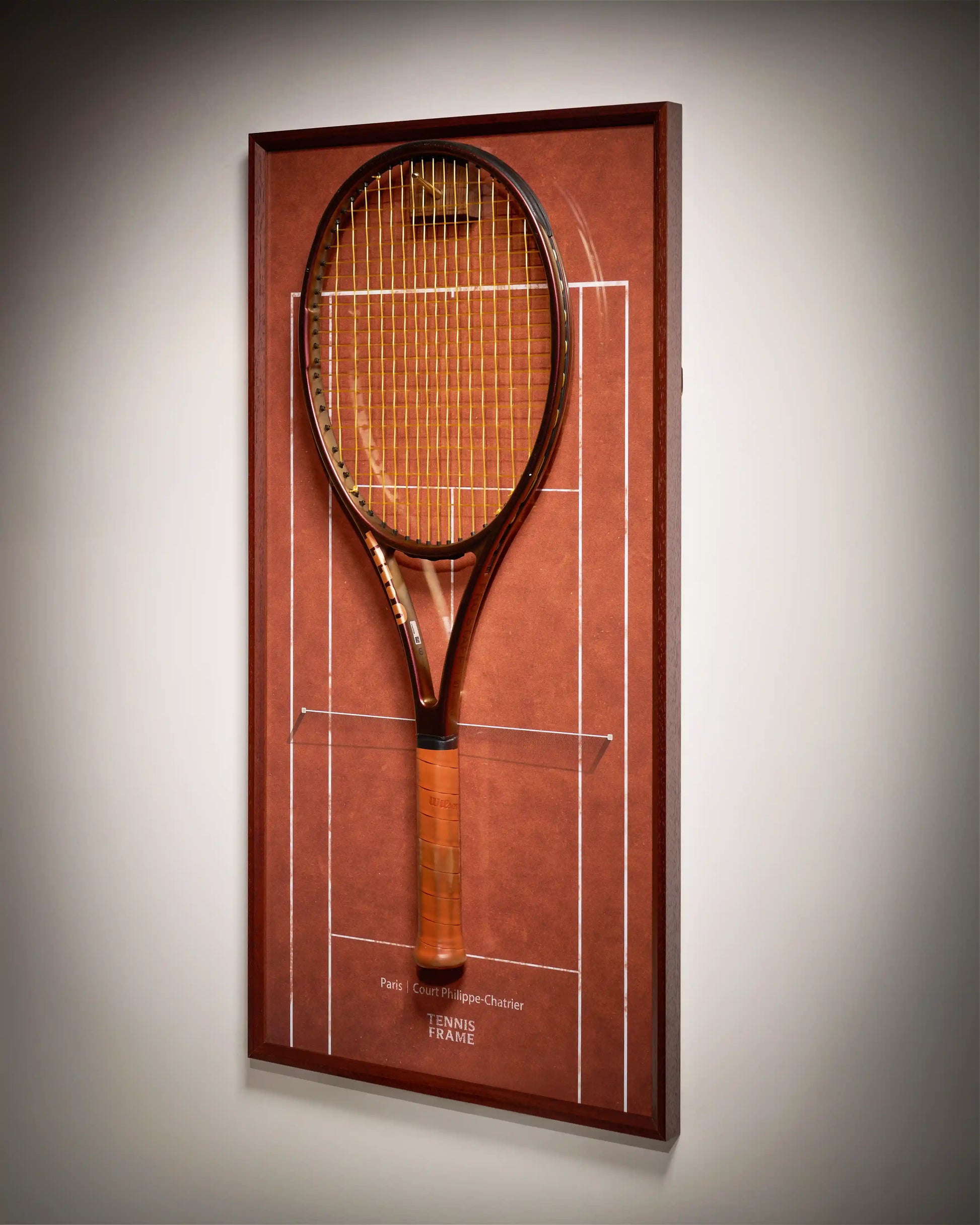 French Open Tennis Frame with racket on Court Philippe-Chatrier clay background, premium wall art photographed at side angle