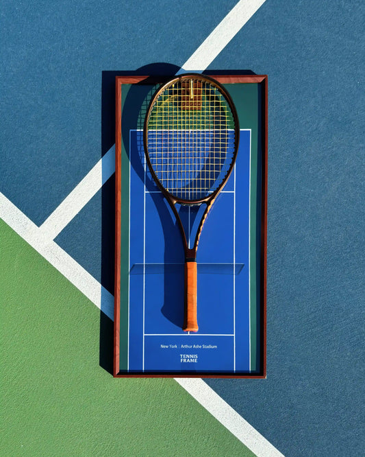 US Open Tennis Frame displaying a Wilson ProStaff racket on Arthur Ashe Stadium blue background, top-down on tennis court