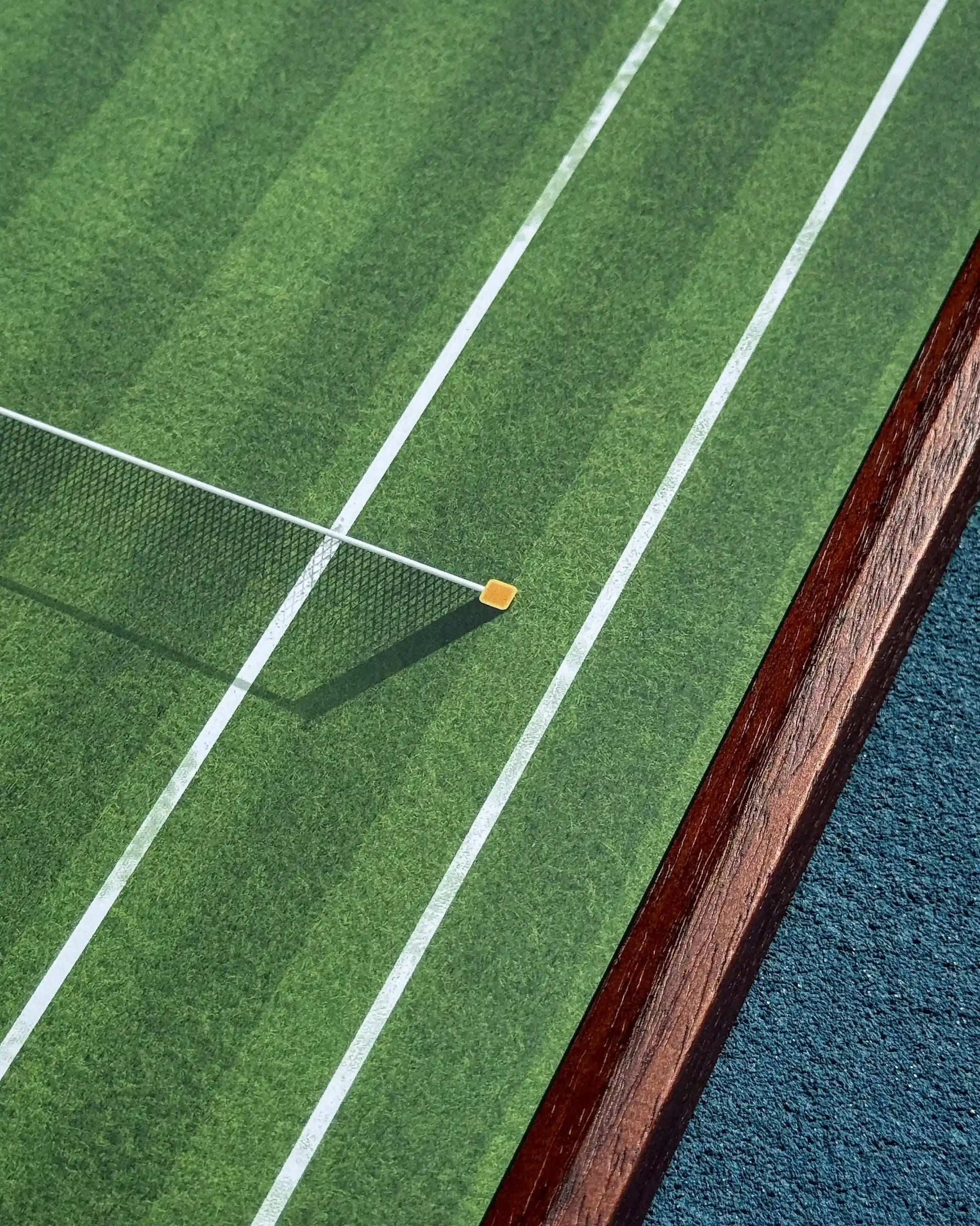 Corner detail of Wimbledon Centre Court Tennis Frame with clear support pin, grass court lines, and wood frame edge on blue court