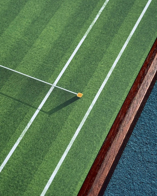 Corner detail of Wimbledon Centre Court Tennis Frame with clear support pin, grass court lines, and wood frame edge on blue court
