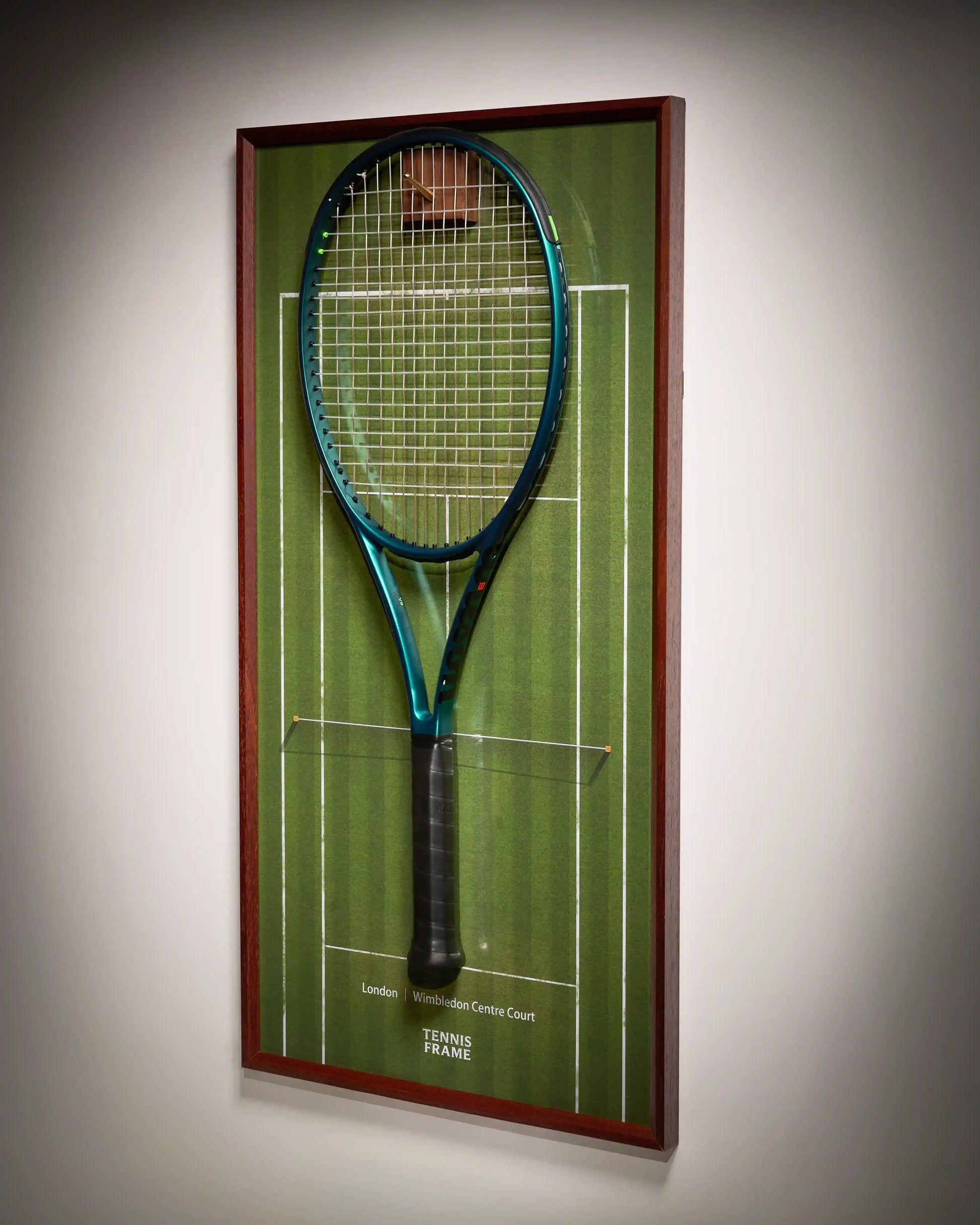 Wimbledon Tennis Frame with green grass court background, racket wall décor photographed at angled view with premium lighting