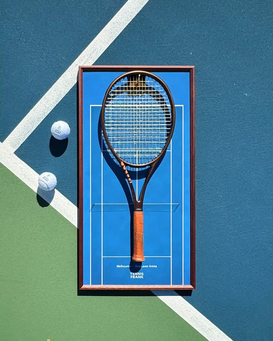 Australian Open Tennis Frame displaying a racket on Rod Laver Arena blue background, top-down shot on tennis court