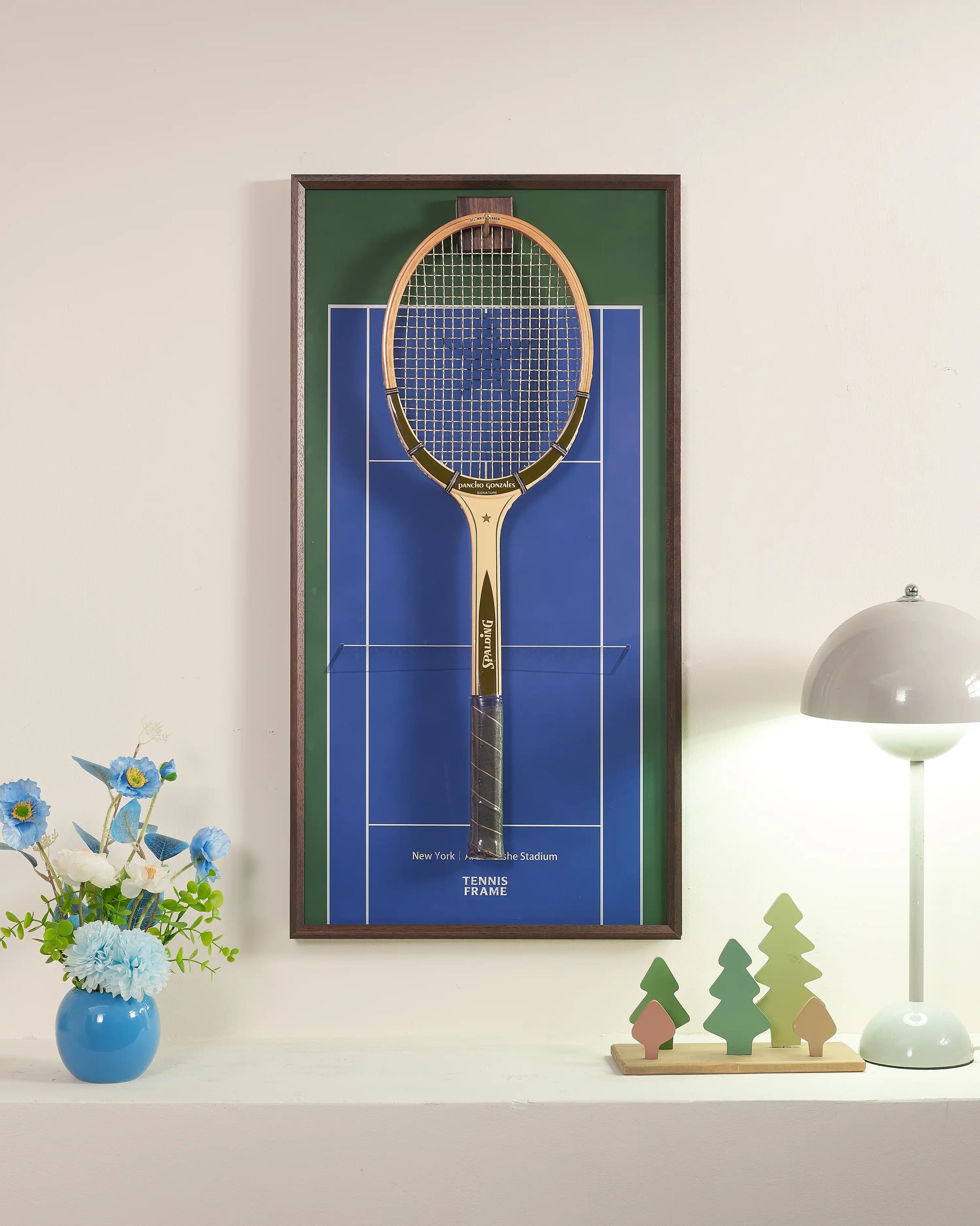 US Open blue court tennis racket display frame in walnut wood, styled with flowers and modern decor